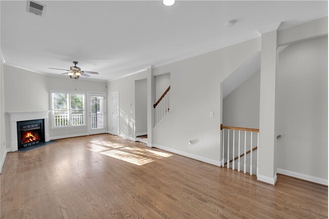 Building Photo - Wonderful craftsman style end-unit townhome