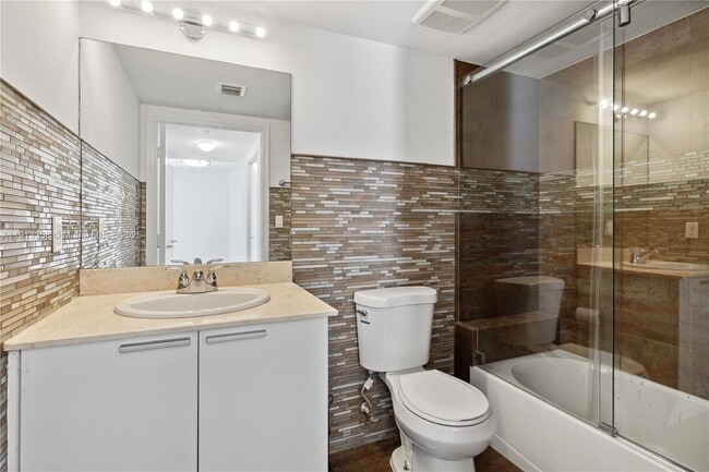 Building Photo - 16699 Collins Ave