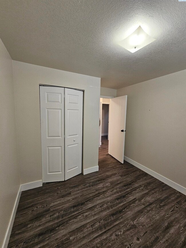 Building Photo - Completely Remodeled Condo; Very Private & Quiet