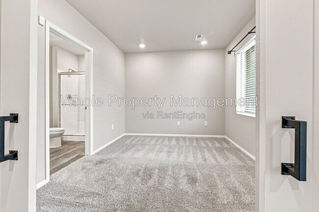Building Photo - 12231 W 57th Dr