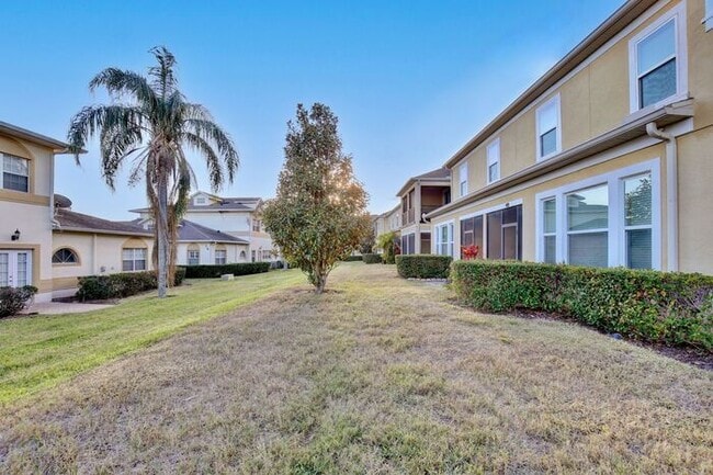 Building Photo - Gorgeous 4/2.5 Spacious Townhome with a Loft Area and a 2 Car Garage in the Desirable Gated Commu...