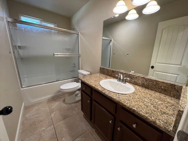 Building Photo - Sanger Home for rent with Solar!