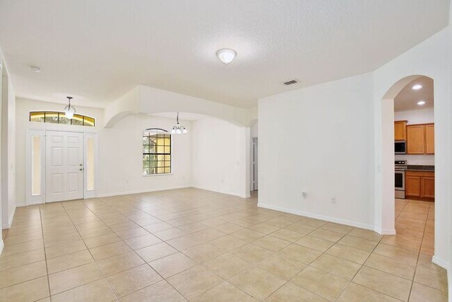 Building Photo - Water-View 4BR/3BA with 3-Car Garage in Gated North Shore - Near Lake Nona & Medical City