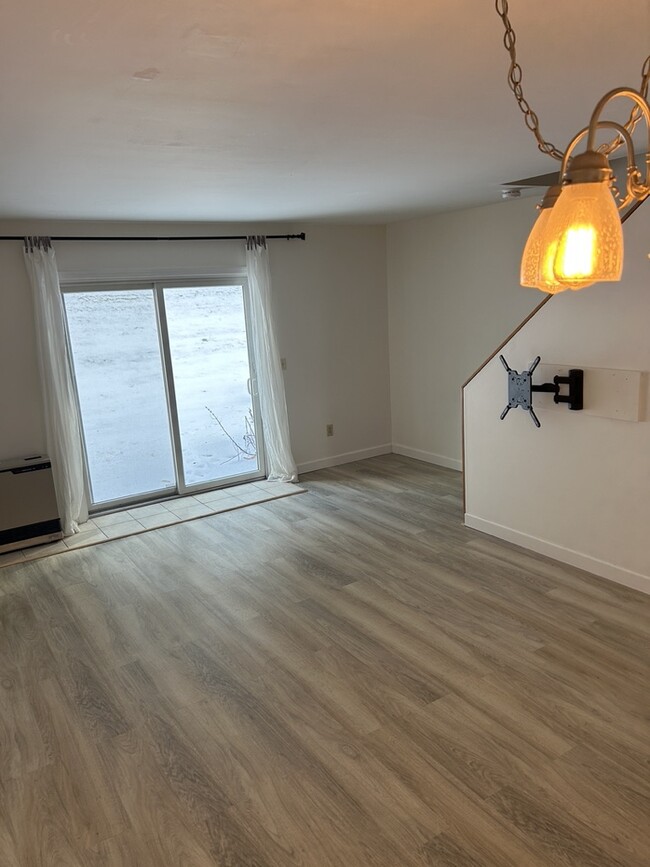 hard wood laminate flooring replaces carpet on first floor - 105 Sugar Tree Ln