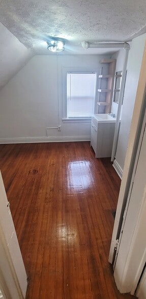 Bedroom with Vanity Sink - 2212 Indianola Ave