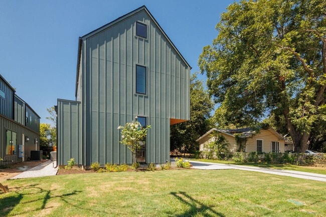 Building Photo - Luxury Redefined: Experience Vibrant Living in this 3-Bedroom Haven in East Austin