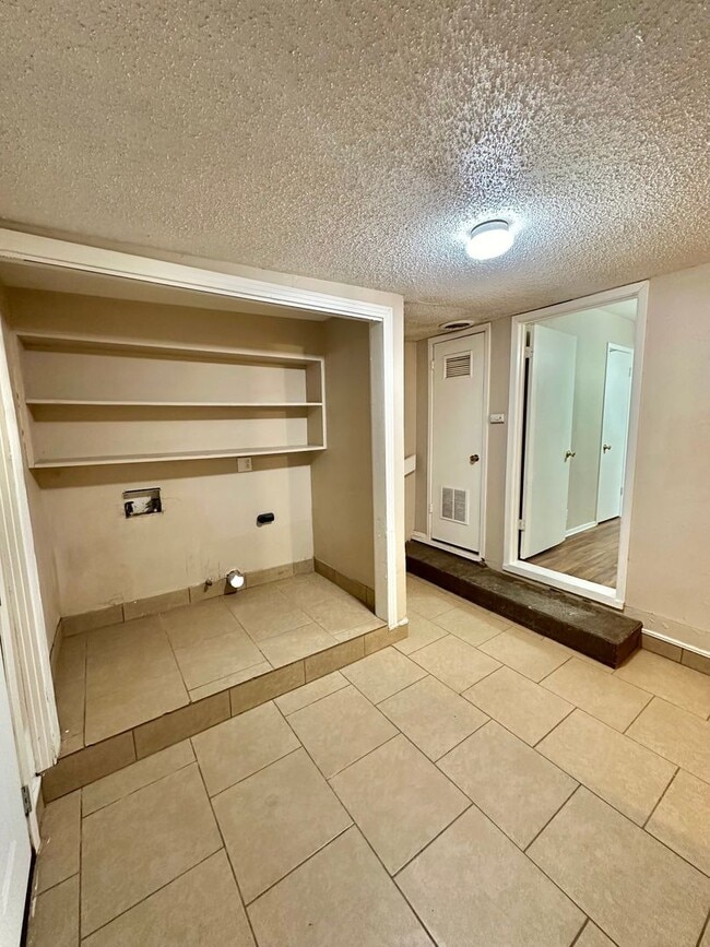 Building Photo - COMING MAY 2026 - Spacious & Centrally Located 3-Bedroom 2-Bathroom Home!