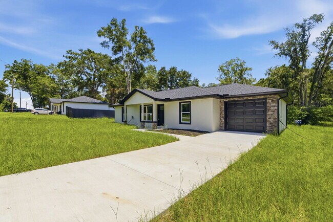 Building Photo - Available Now! New 3/2 Home with Large Backyard and Front Porch