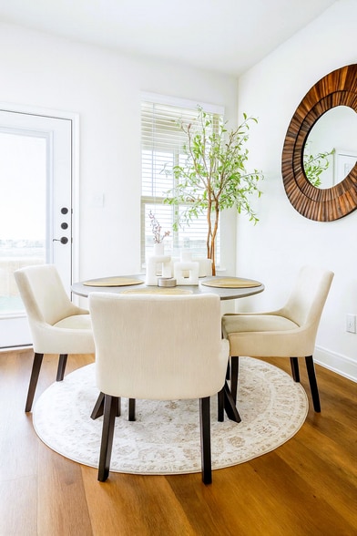 Dining are with a view. This home is offered unfurnished. Staging furniture shown is not included. - 13810 Enzo Gate