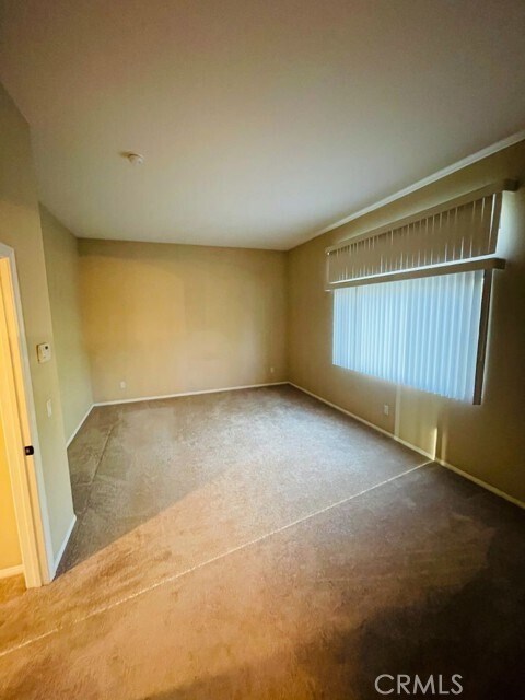 Building Photo - 42020 Dahlia Way