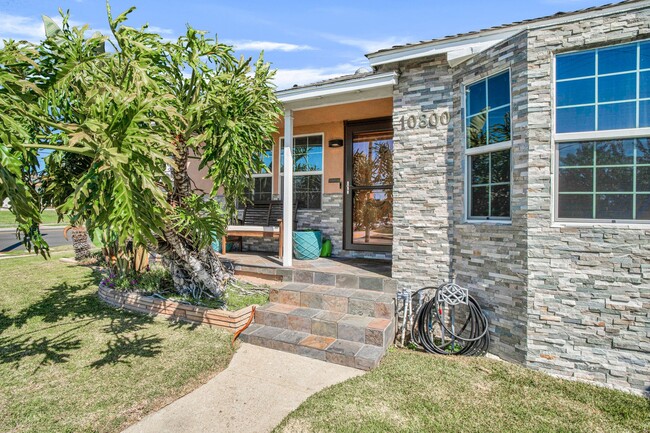 Building Photo - Stunning Remodeled Corner-Lot Home – An En...