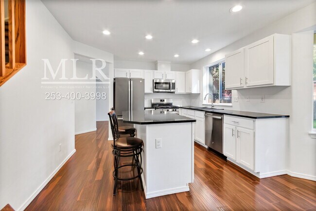 Building Photo - Half-Acre Corner Lot with Hot Tub, Deck, a...