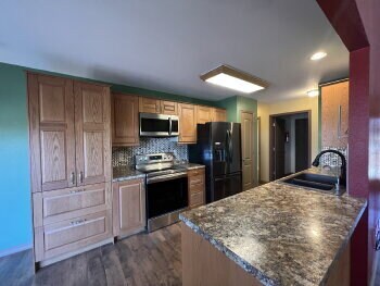 Building Photo - Basement home with a fenced in backyard