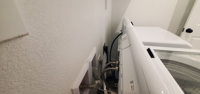 Building Photo - Beautifully designed modern townhome with attached garage.