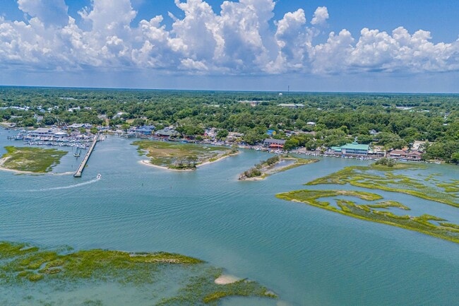 Building Photo - Live the Coastal Lifestyle in This Cypress Keys Beauty!