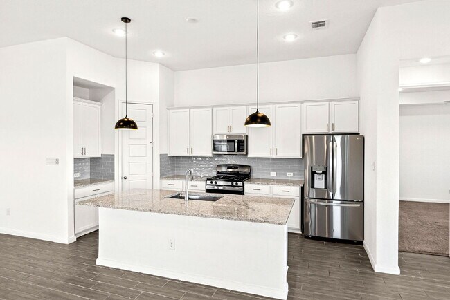 Building Photo - The Perfect Blend of Space, Style, and Community Living