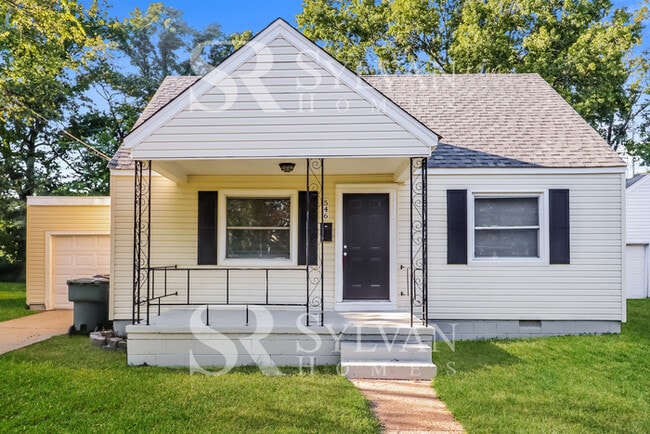 Building Photo - Welcome to this charming abode.
