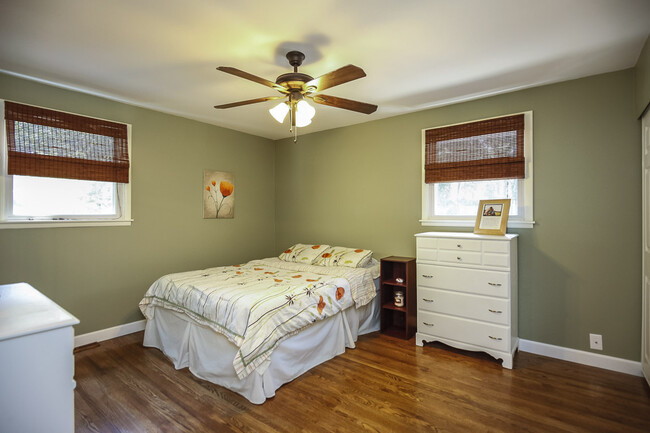 Photo 7. Master Bedroom with two windows, original hardwood floors - 1623 Lethia Dr