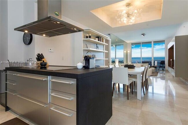 Building Photo - 18201 Collins Ave