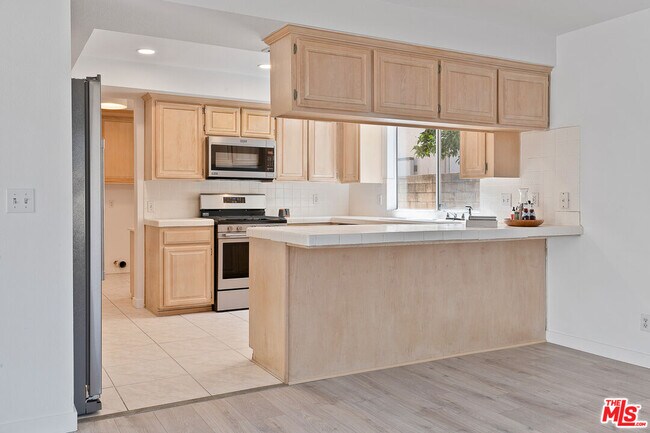 Building Photo - 8473 Penfield Ave