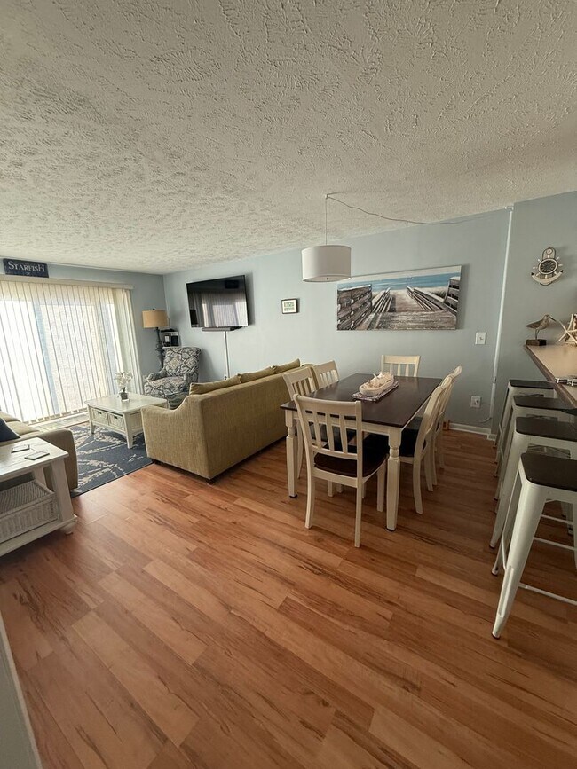 Building Photo - NEW OWNERS OF THIS FURNSIHED OFF-SEASON RE...