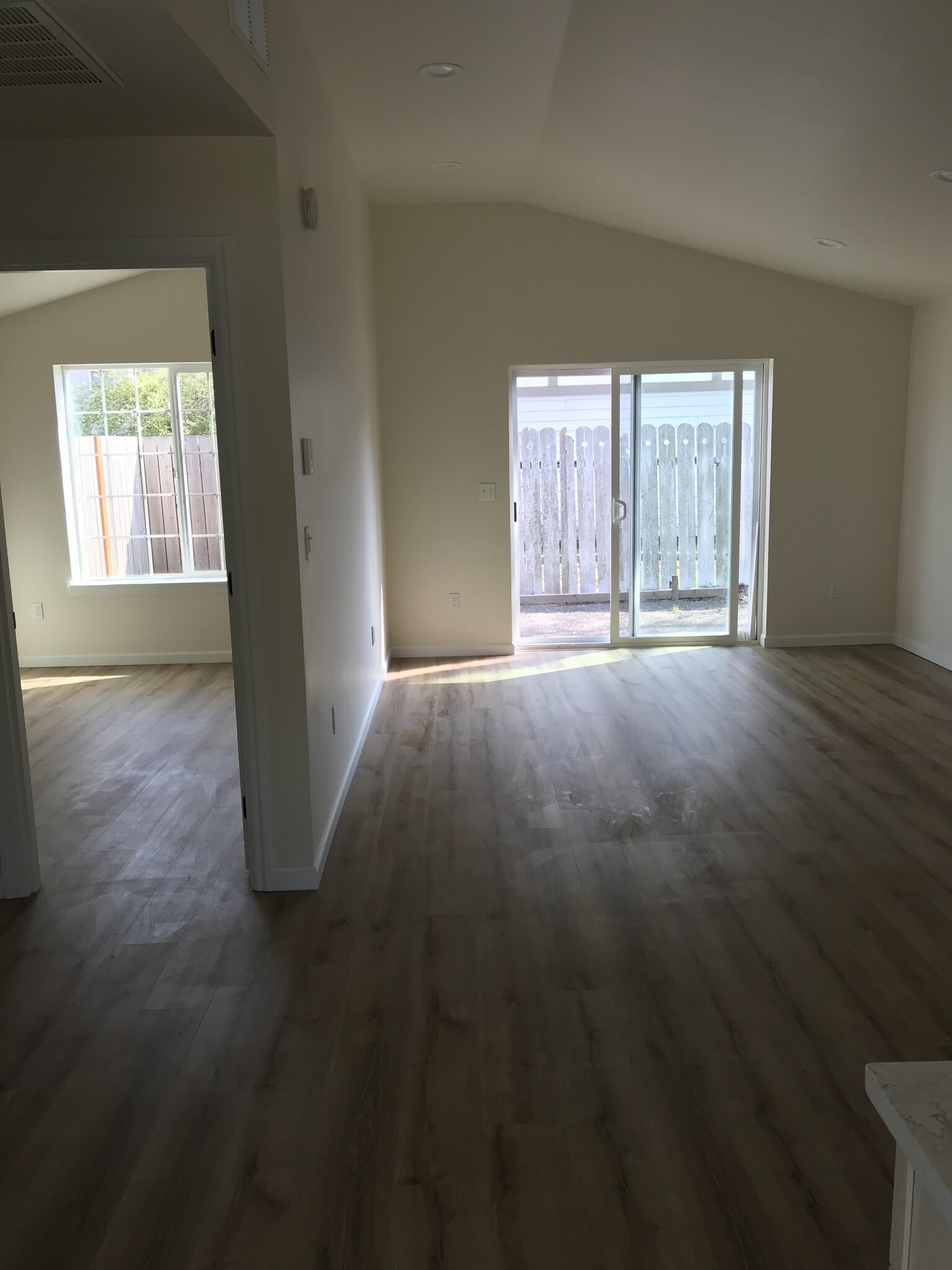 Living room (right) and bedroom (left) - 224 NE Jefferson St