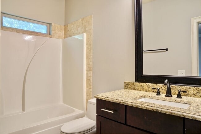 Building Photo - Heisman Villas: End Unit with Parking & Pr...