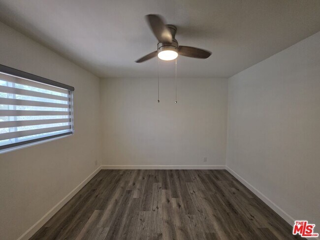 Building Photo - 10734 Palms Blvd
