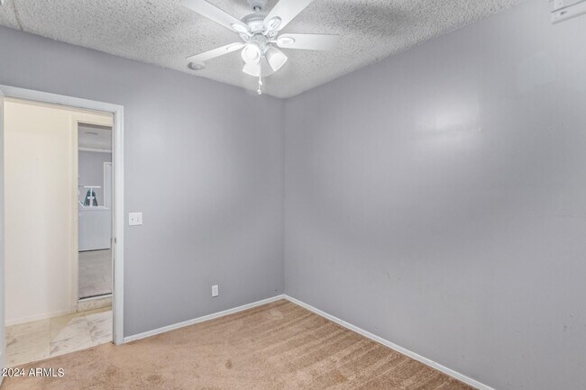 Building Photo - 8902 E Cholla St