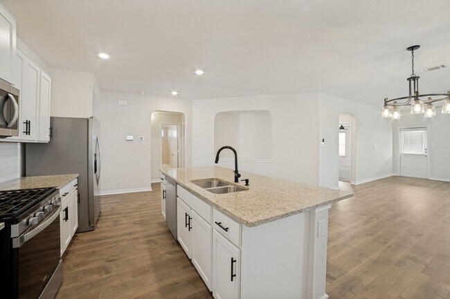Building Photo - Welcome home to this 4/2/2 nestled in Whisper Falls