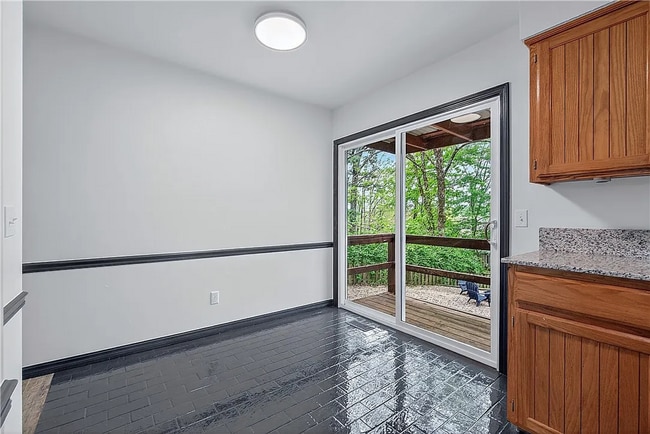 Building Photo - 8517 Spruce Dr