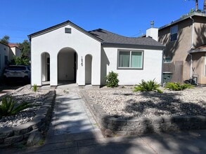 Building Photo - Beautiful Land Park home with fresh paint and new flooring throughout.
