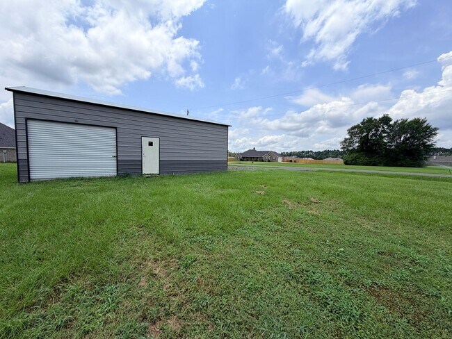 Building Photo - 3520 Windwood Circle.