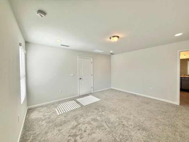 Building Photo - Stunning End Unit 3BD, 2.5BA Wendell Townhome with a 2-Car Garage in a Gorgeous HOA Community wit...