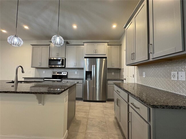 Building Photo - 8936 Matriarca Aly