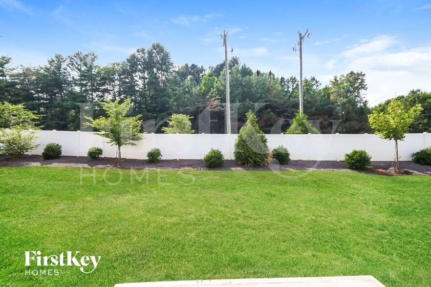 Building Photo - 9018 Evans Woods Dr