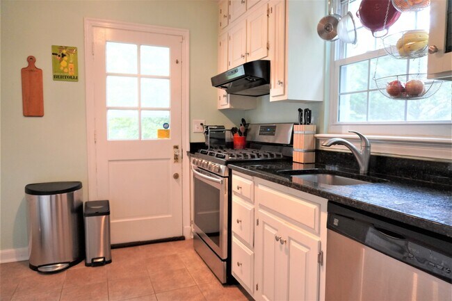 Kitchen w/ side door - 215 Crestmoor Cir