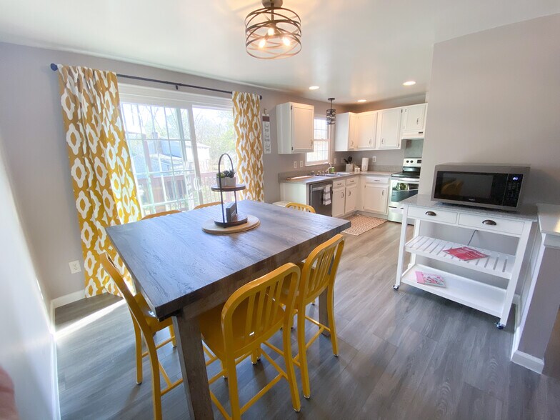 Counter height dining table - 11423 Five Cedars Rd