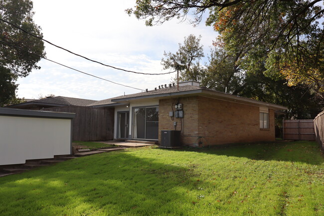 Huge backyard with beautiful trees and freshly painted exteriors. - 13559 Red Fern Ln