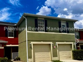 Building Photo - 3 bedroom 2.5 bath Oakcrest Townhome with Laminate and Tile flooring Throughout, and a 1 Car Garage!