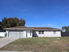 Building Photo - 4 BEDROOM 2 Bath  Pool Home!  Call Carole Arcaro 386-216-4900 Deltona Lakes Realty