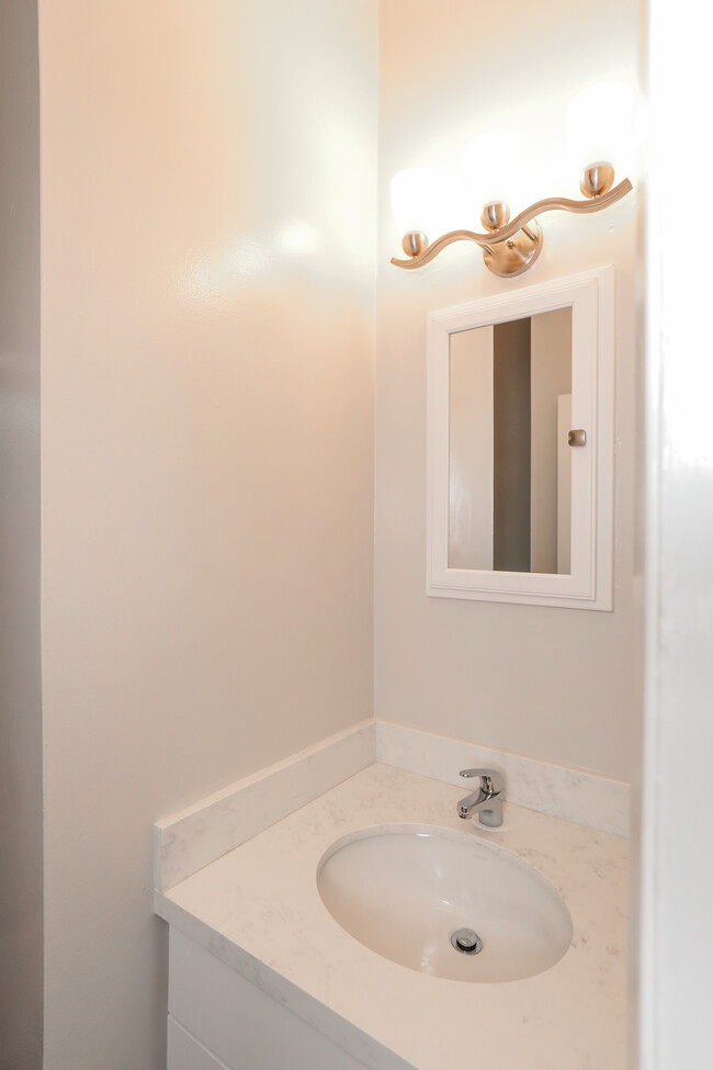 Updated bath with Quartz countertop - 3321 Alma St