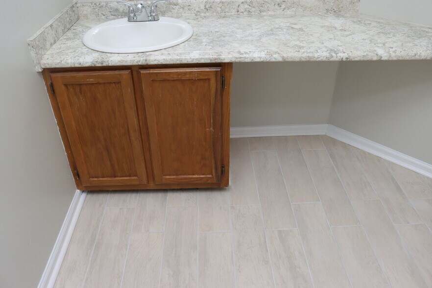 Upstairs Bathroom Sink & Cabinet - 1057 Stones Throw Dr NW