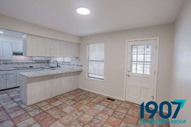 Building Photo - Charming Brick Home with Large Backyard in OKC! - Move In Now & Get 50% Off Your First & Second M...