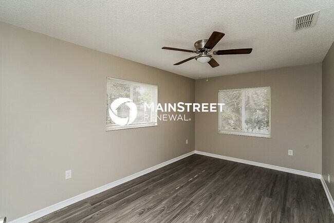 Building Photo - 4 Bedroom Pet-Friendly Home in Land O' Lakes, FL with Main Street Renewal