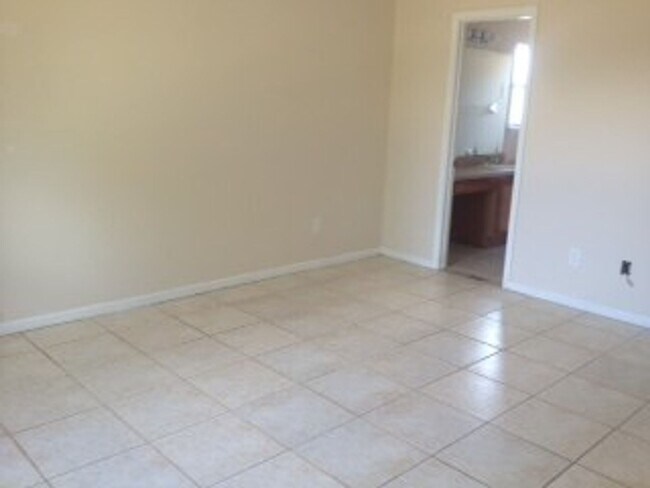 Building Photo - 3-bedroom, 2-bath single-family home for rent