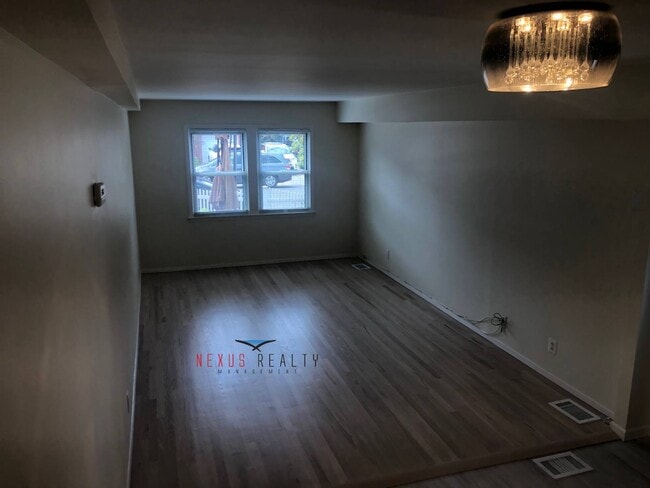 Building Photo - 225-01 59th Ave