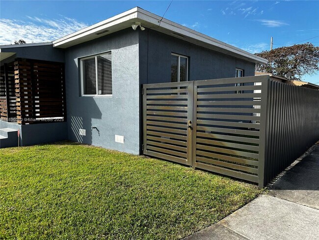 Building Photo - 6844 NW 5th Ave