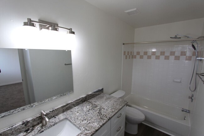 Building Photo - Remodeled End-Unit Townhome @ Village at Elk Run | 3 Bed, 2.5 Bath + 2-Car Garage