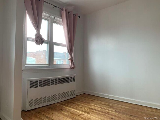 Building Photo - 32-39-39 55th St